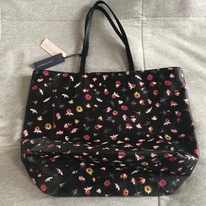 Rebecca Minkoff large multi color hand bag.